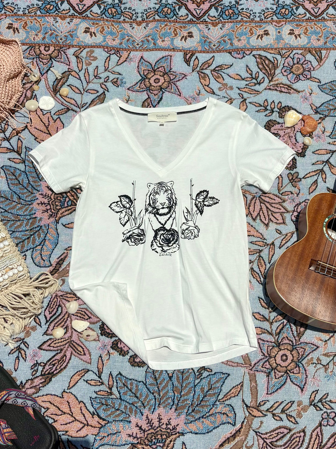 white v-neck tee with tiger, rose, and leaf depiction on front.