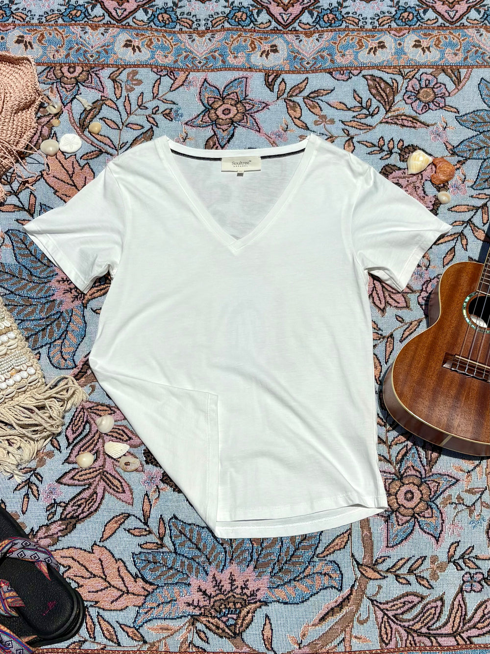 plain white v-neck tee.
