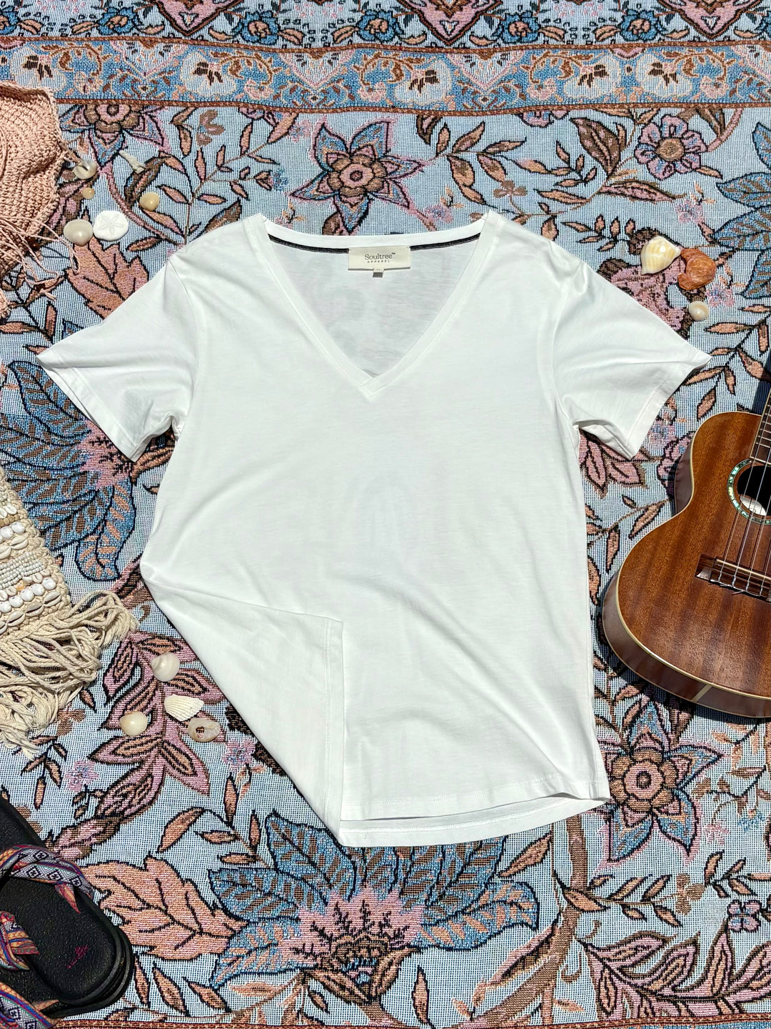 plain white v-neck tee.