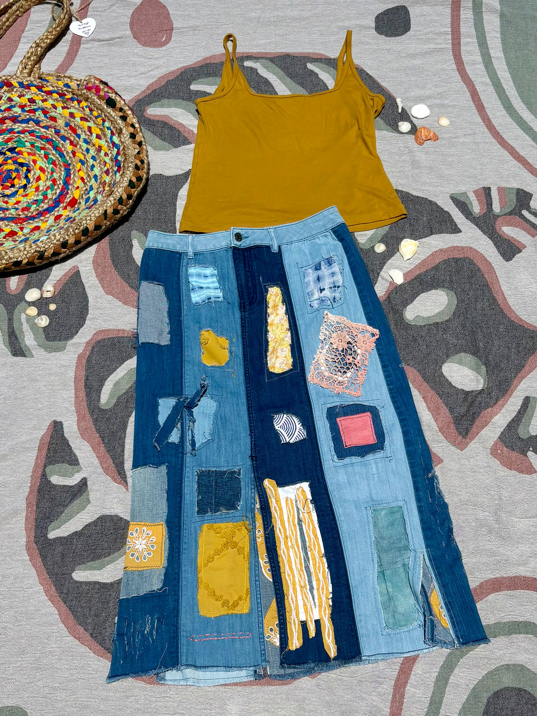 multi-shade denim maxi skirt with patchwork of different colors patterns, and fabrics.